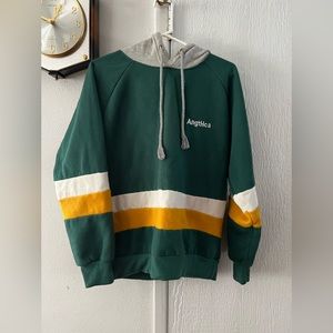 Green hoodie with yellow and gray stripe